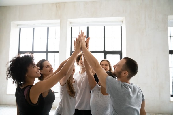 Teachers high-fiving
